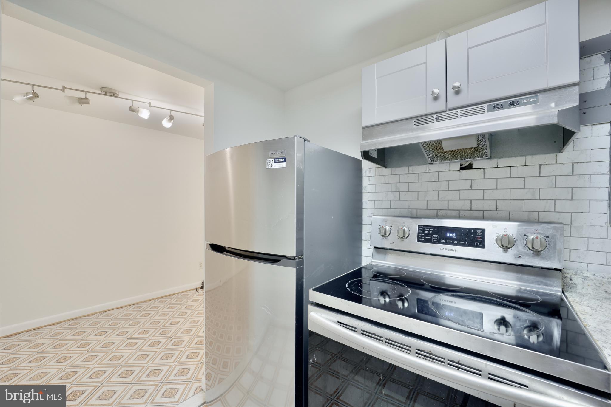 1926 15th Street Northwest, Unit 1 Washington, DC 20009 - Photo 10 of 13 a close view of a stove in kitchen