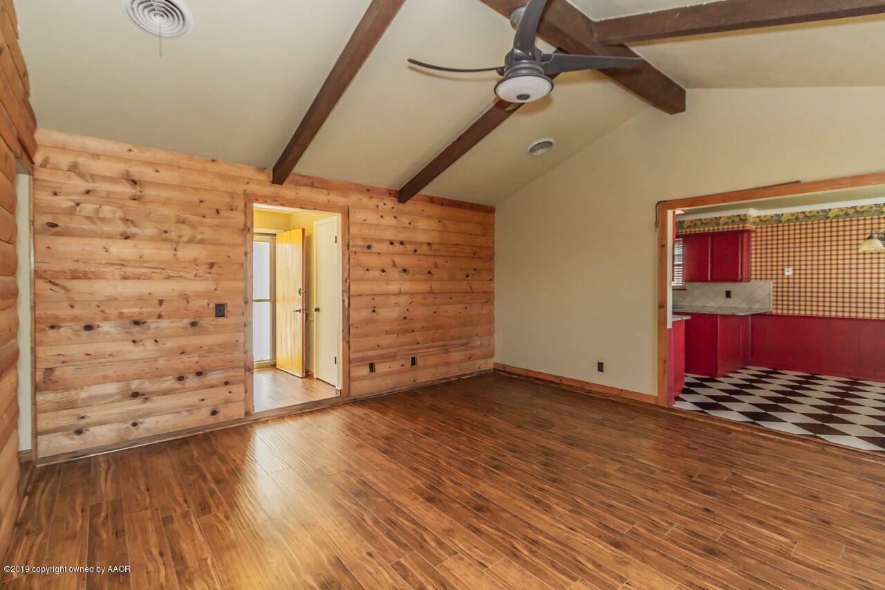 5337 Whitney Lane Amarillo, TX 79110 - Photo 12 of 32 a view of empty room with wooden floor