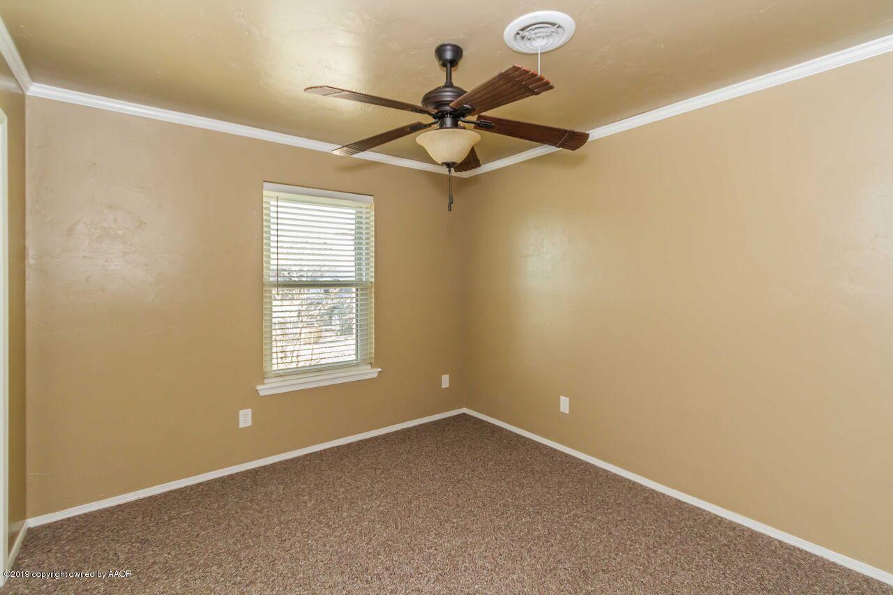 5337 Whitney Lane Amarillo, TX 79110 - Photo 24 of 32 an empty room with a window