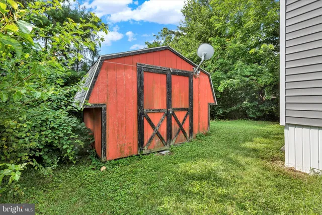 a view of backyard with green space