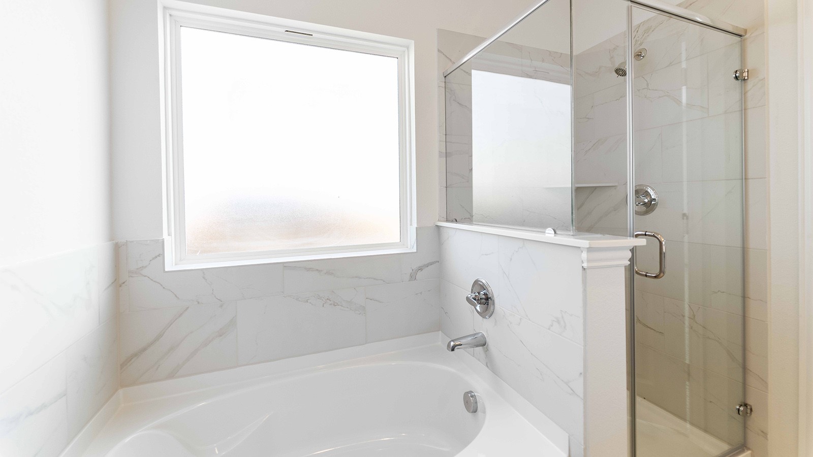 13621 Endless Narrow Lane Elgin, TX 78621 - Photo 18 of 19 a bathroom with a bathtub and a shower