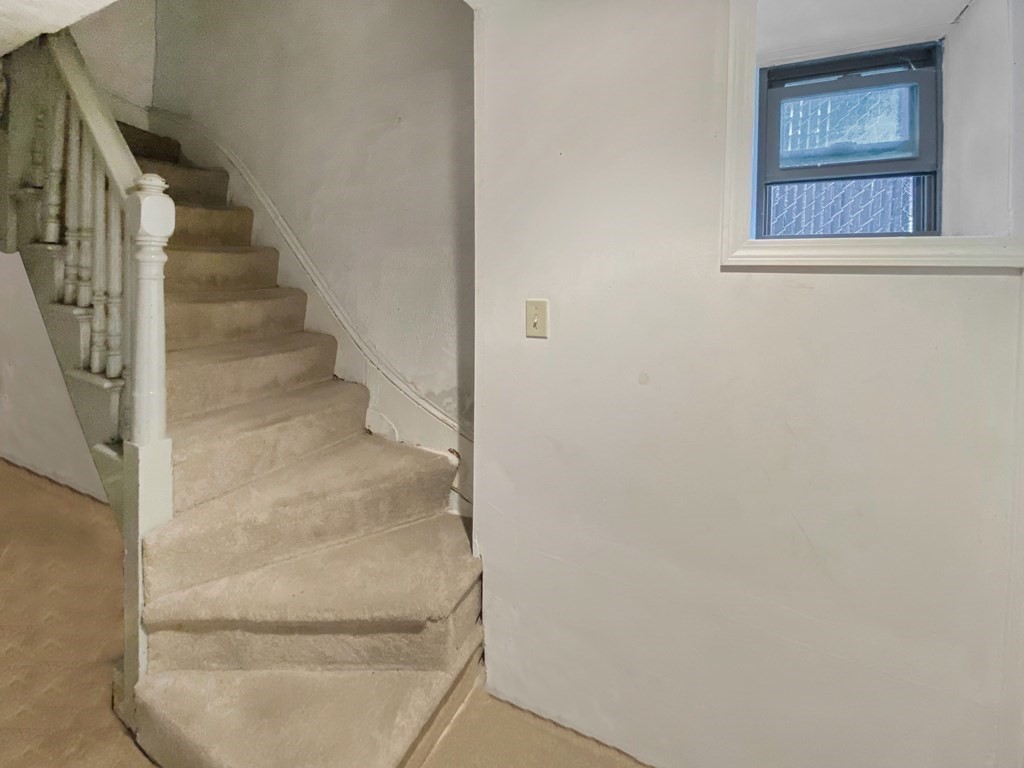 363 West 3rd Street, Unit 1 Boston, MA 02127 - Photo 9 of 12 a view of staircase with white walls