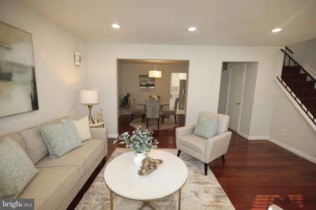 a close view of dining table and chairs