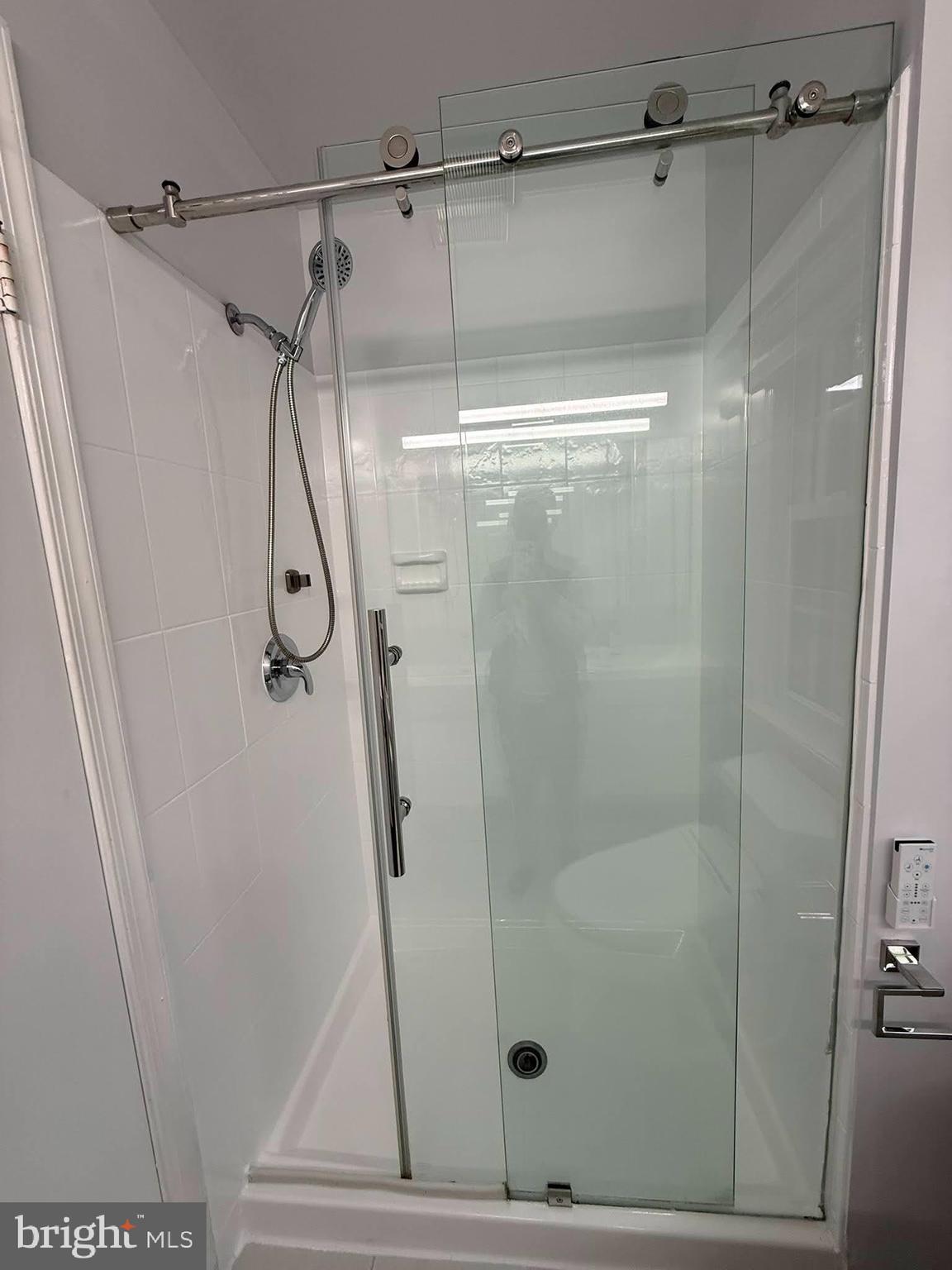 8580 Tyrolean Way Springfield, VA 22153 - Photo 31 of 63 a bathroom with a shower