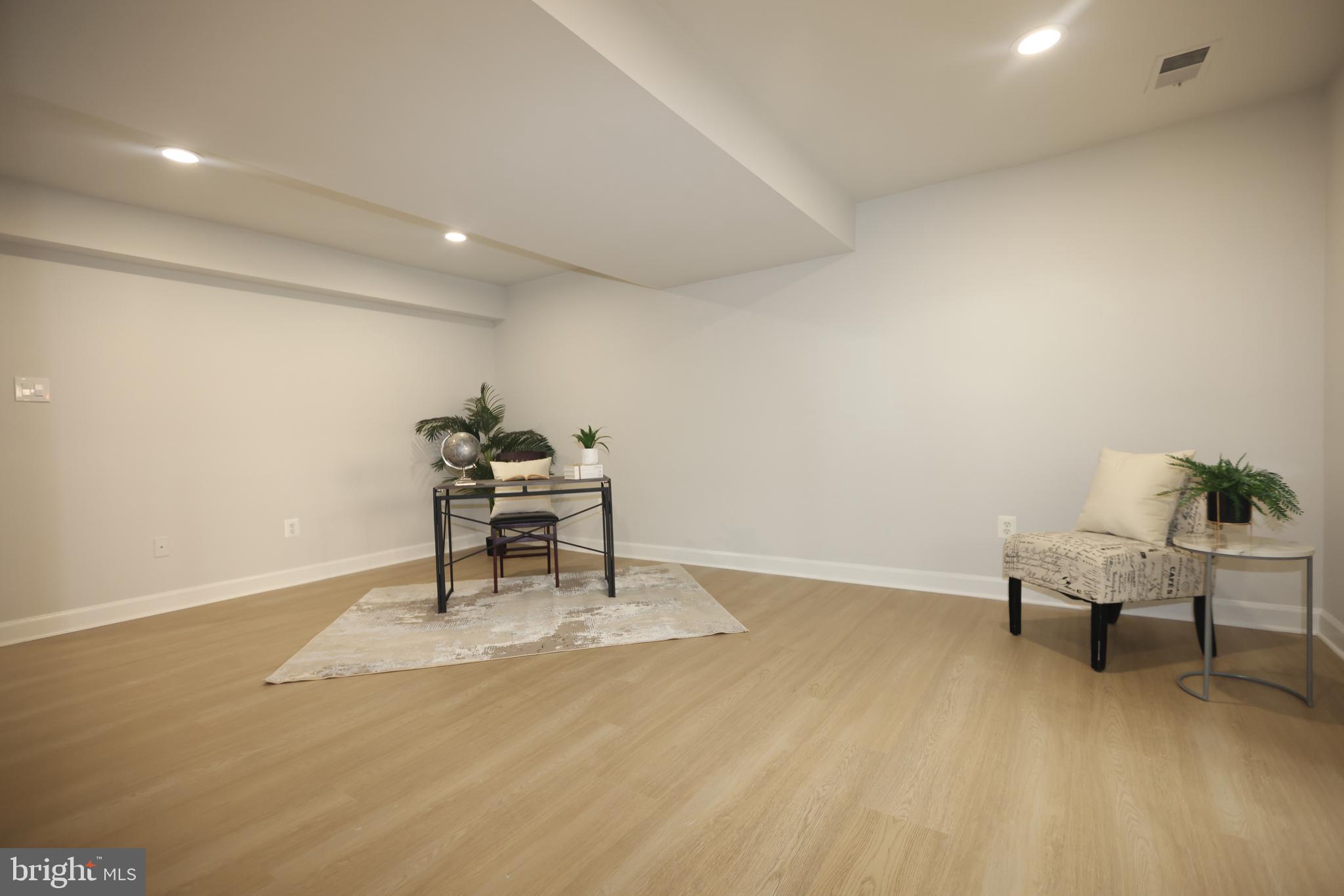 8580 Tyrolean Way Springfield, VA 22153 - Photo 42 of 63 a living room with furniture and a piano