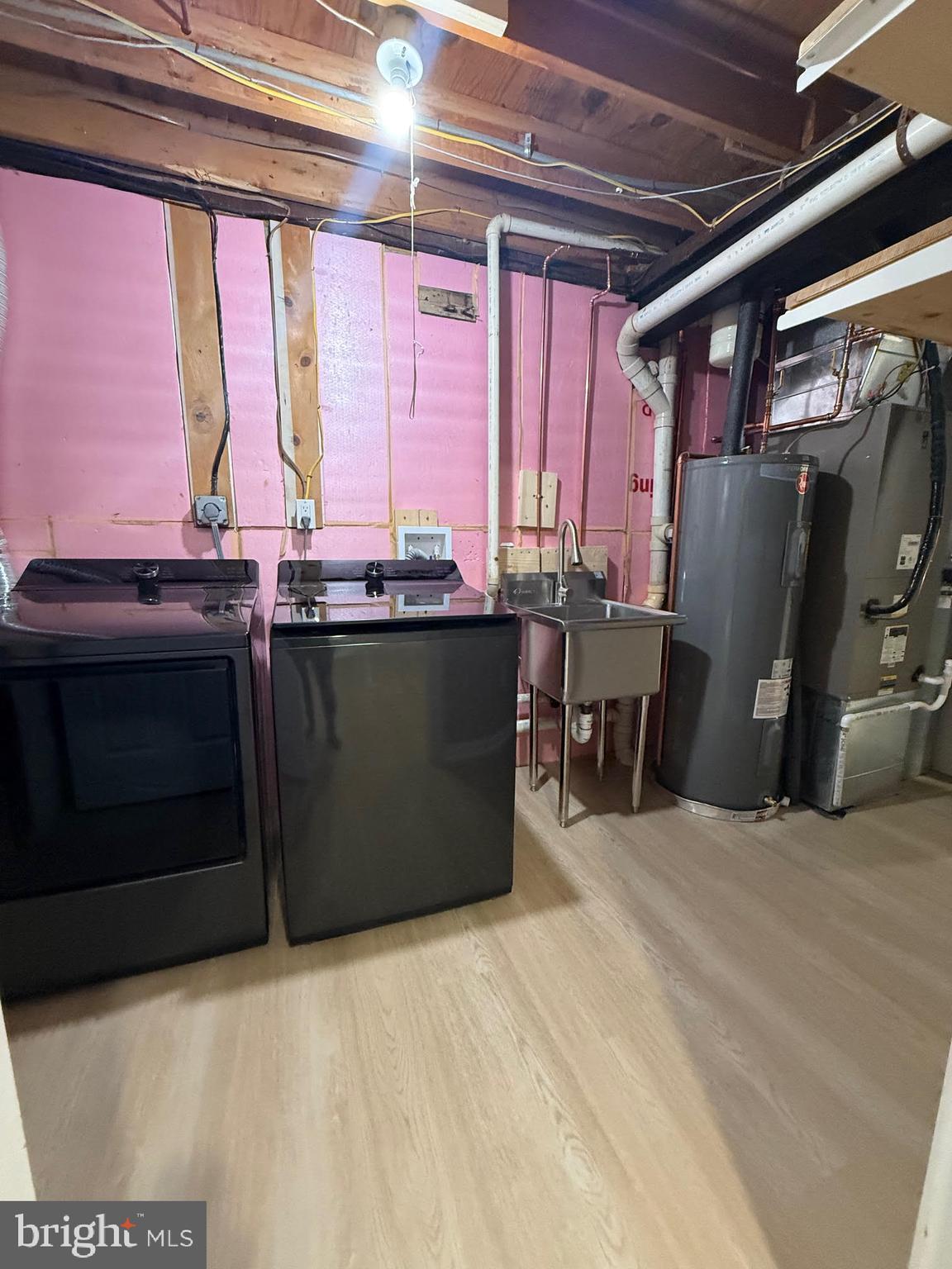 8580 Tyrolean Way Springfield, VA 22153 - Photo 46 of 63 a kitchen with a stove and a refrigerator