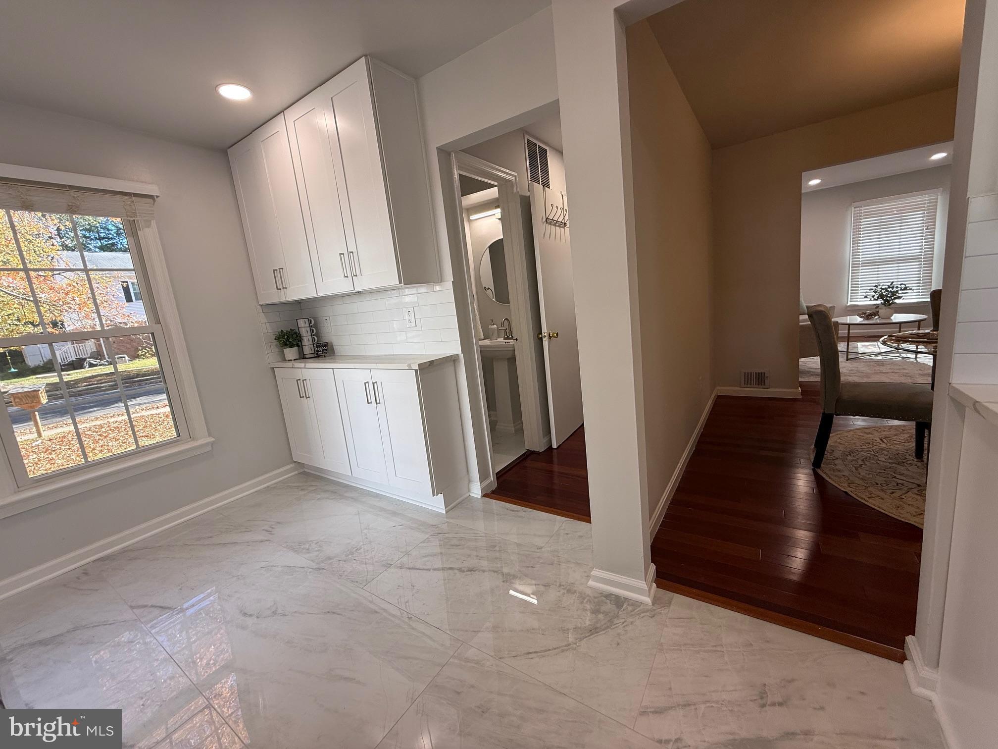 8580 Tyrolean Way Springfield, VA 22153 - Photo 59 of 63 a view of a kitchen with furniture and a window