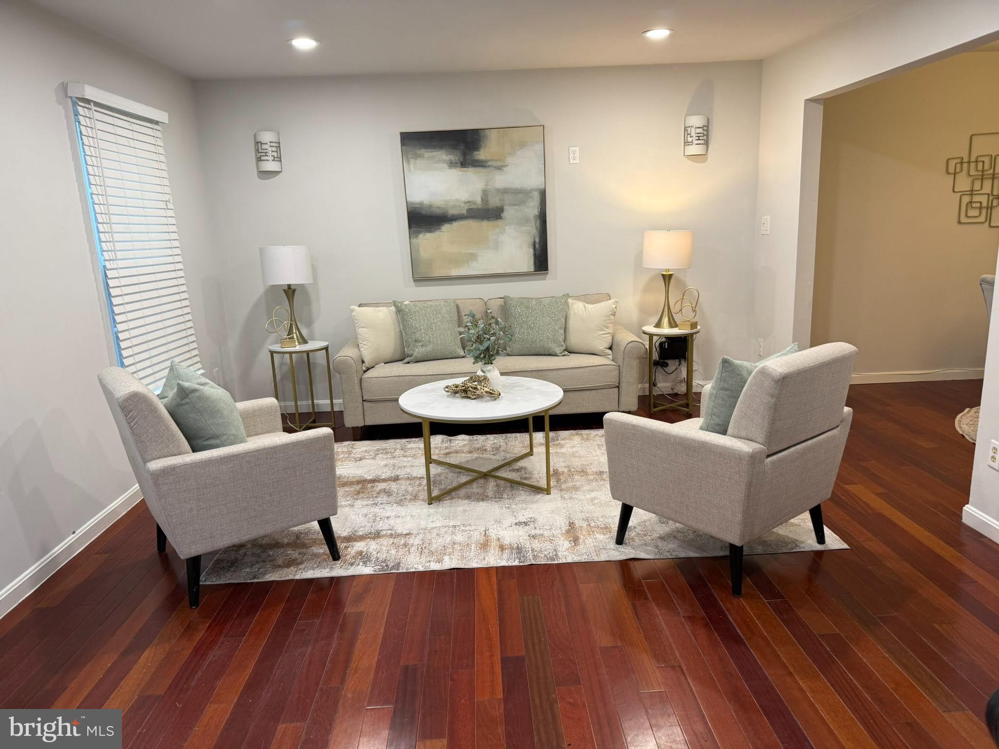 8580 Tyrolean Way Springfield, VA 22153 - Photo 10 of 63 a living room with furniture and a wooden floor