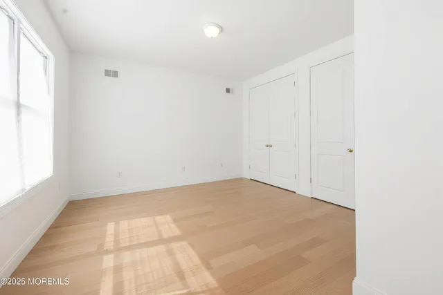 an empty room with a natural light