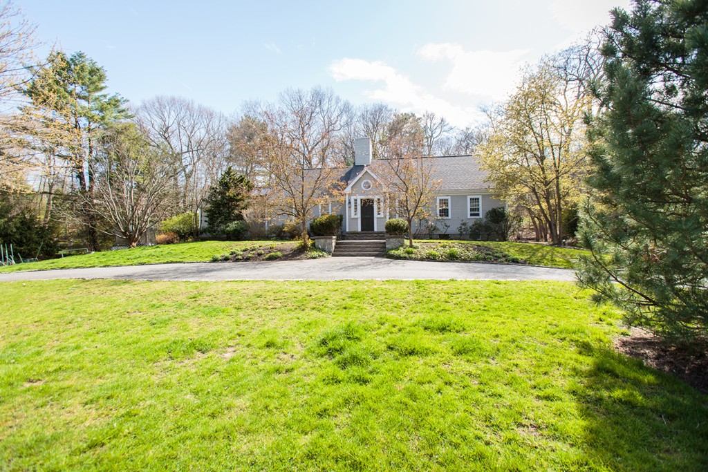 37 Ravine Road Wellesley, MA 02481 - Photo 1 of 2 a view of swimming pool in front of residential houses