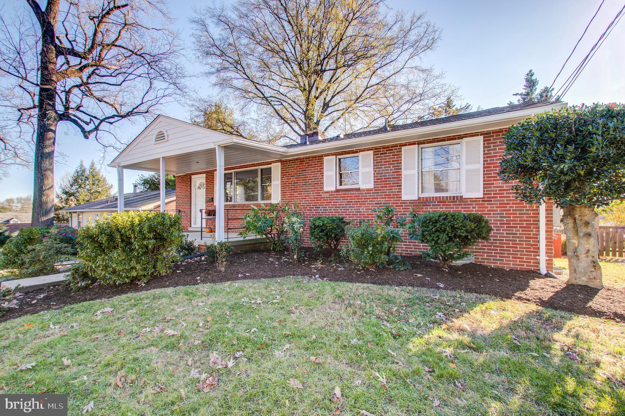 1004 Stirling Road Silver Spring, MD 20901 - Photo 1 of 27 a front view of a house with garden