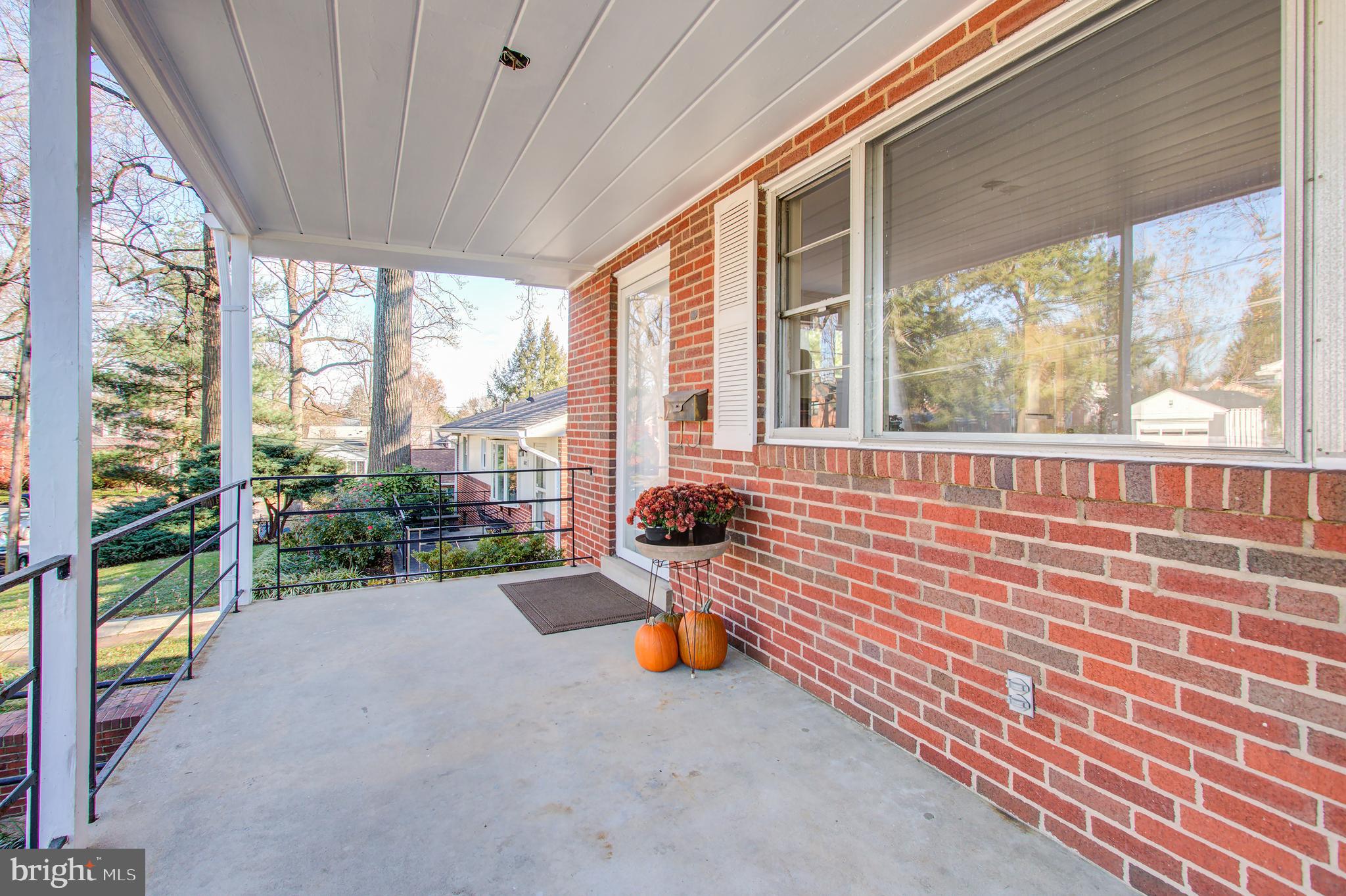 1004 Stirling Road Silver Spring, MD 20901 - Photo 2 of 27 a view of a porch with furniture and garden