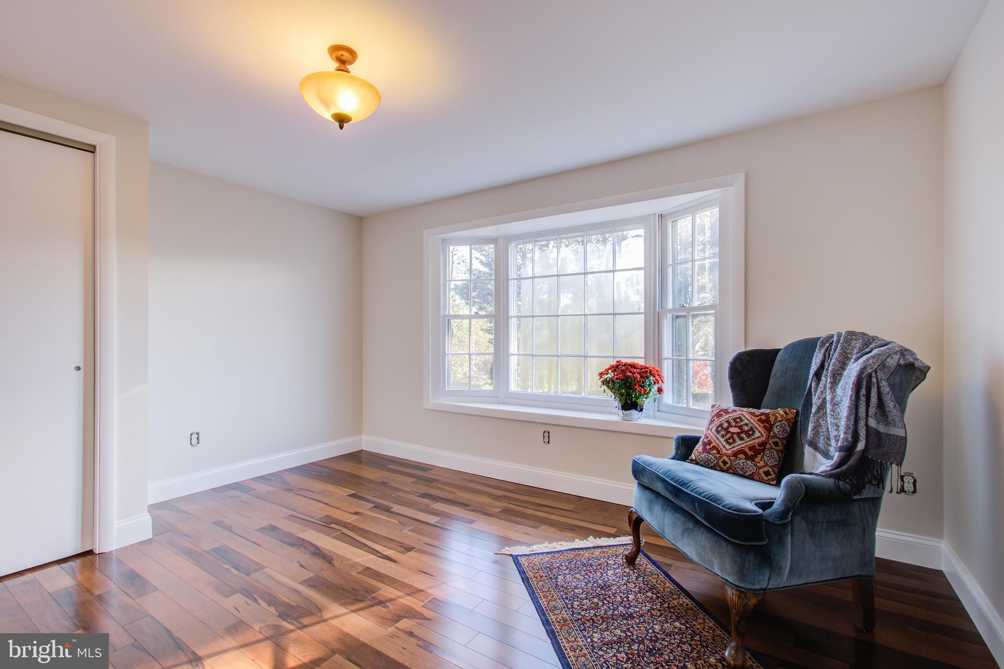 1004 Stirling Road Silver Spring, MD 20901 - Photo 16 of 27 a living room with furniture and a window