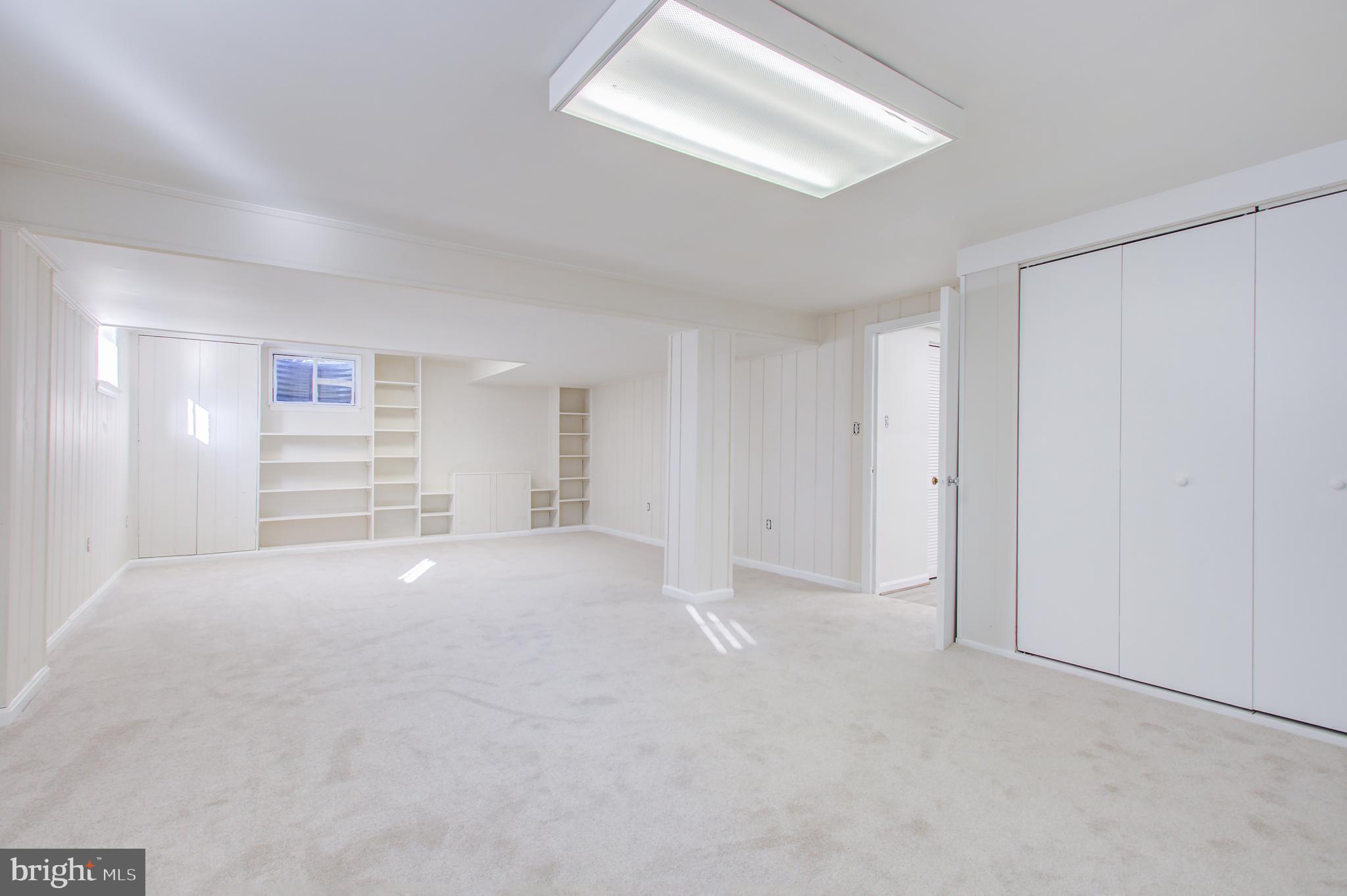 1004 Stirling Road Silver Spring, MD 20901 - Photo 22 of 27 a view of an empty room with a window