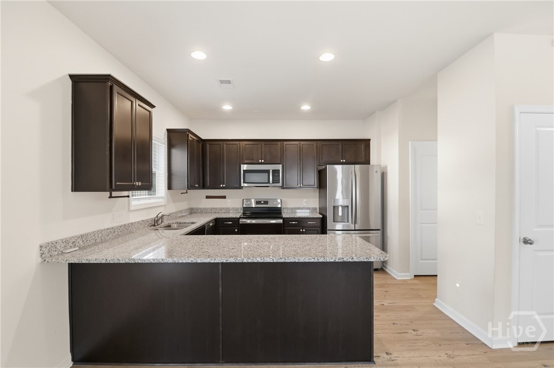 233 Caroline Way Guyton, GA 31312 - Photo 12 of 33 Kitchen