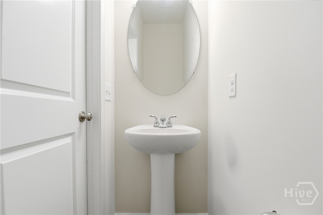 233 Caroline Way Guyton, GA 31312 - Photo 16 of 33 Half bath downstairs