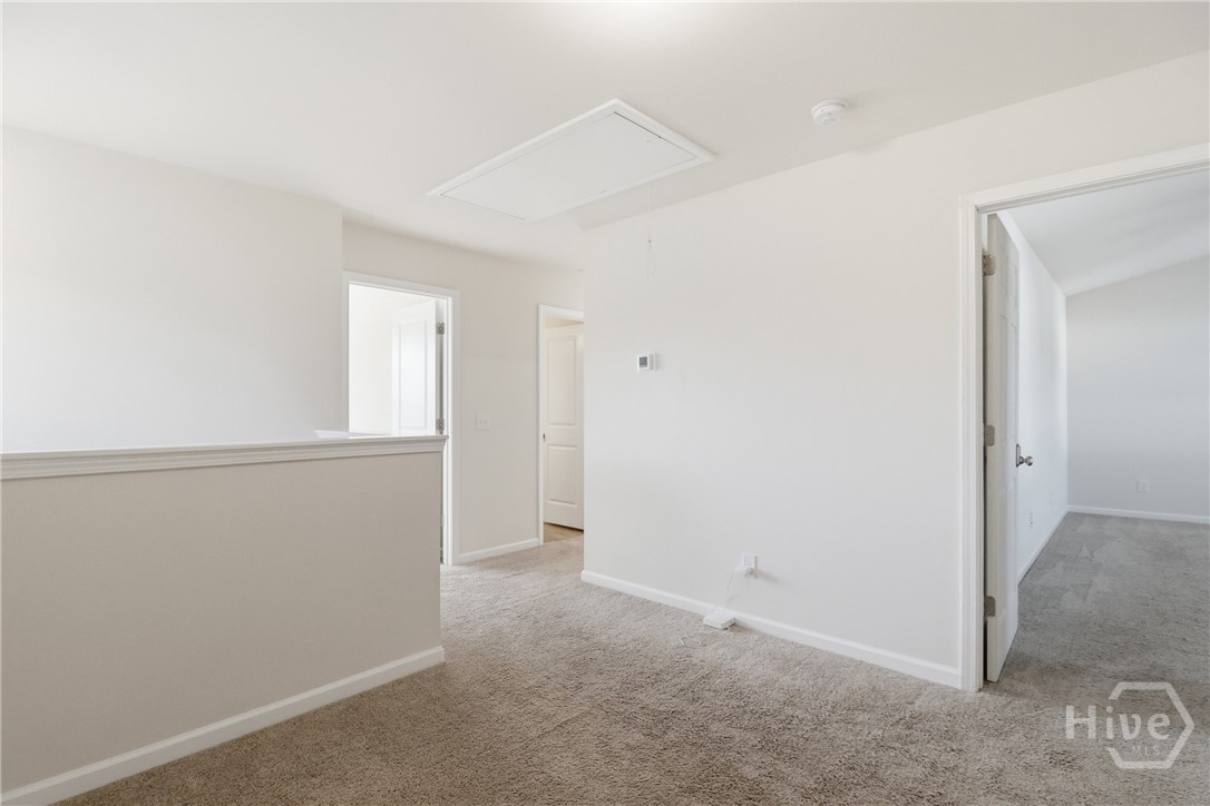 233 Caroline Way Guyton, GA 31312 - Photo 17 of 33 Landing area upstairs