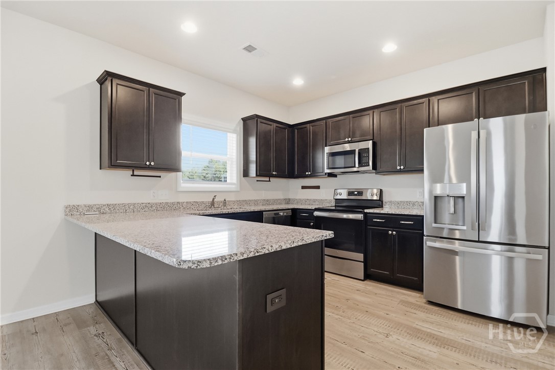 233 Caroline Way Guyton, GA 31312 - Photo 9 of 33 Kitchen