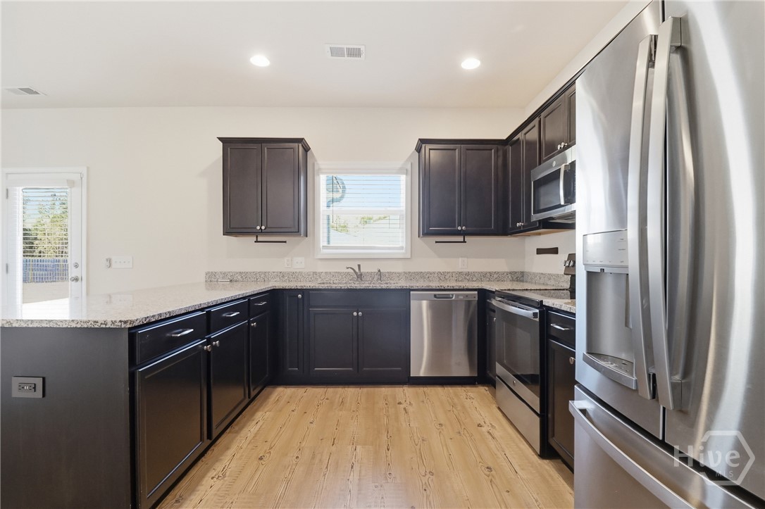 233 Caroline Way Guyton, GA 31312 - Photo 10 of 33 Kitchen