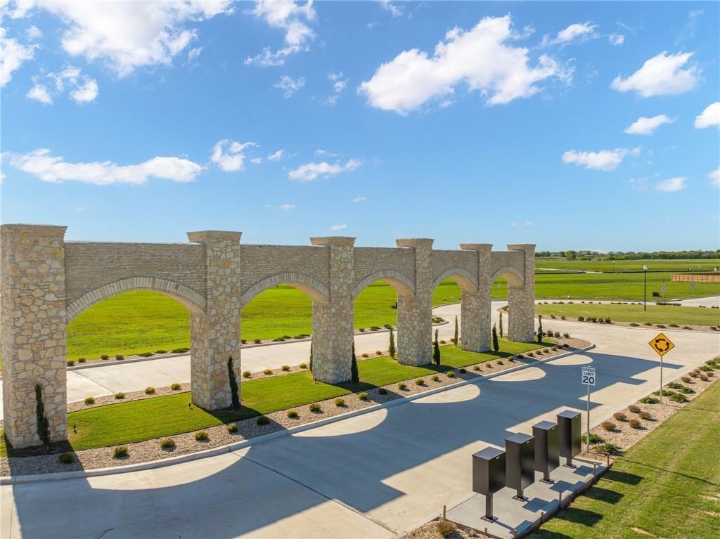 a view of swimming pool with seating space