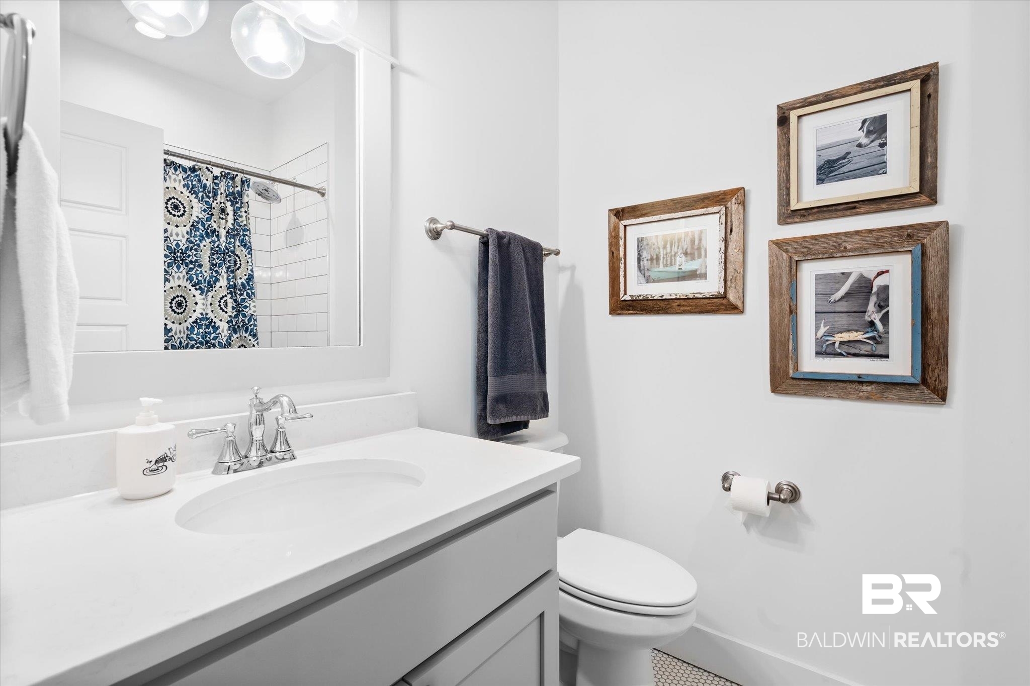 15 Semmes Avenue Mobile, AL 36604 - Photo 17 of 43 Bathroom with tile patterned flooring, vanity, a shower with shower curtain, and toilet