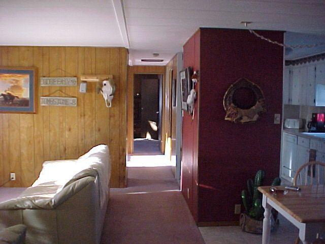 14631 Fisk Road Yakima, WA 98908 - Photo 3 of 18 a living room with furniture and a potted plant