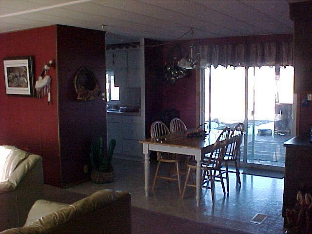 14631 Fisk Road Yakima, WA 98908 - Photo 8 of 18 a view of a dining room with furniture window and wooden floor