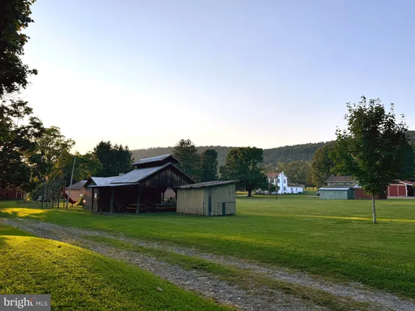 a view of a house with a big yard