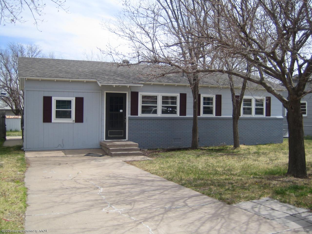 5019 Bowie Street Amarillo, TX 79110 - Photo 1 of 10 a view of a house with a yard