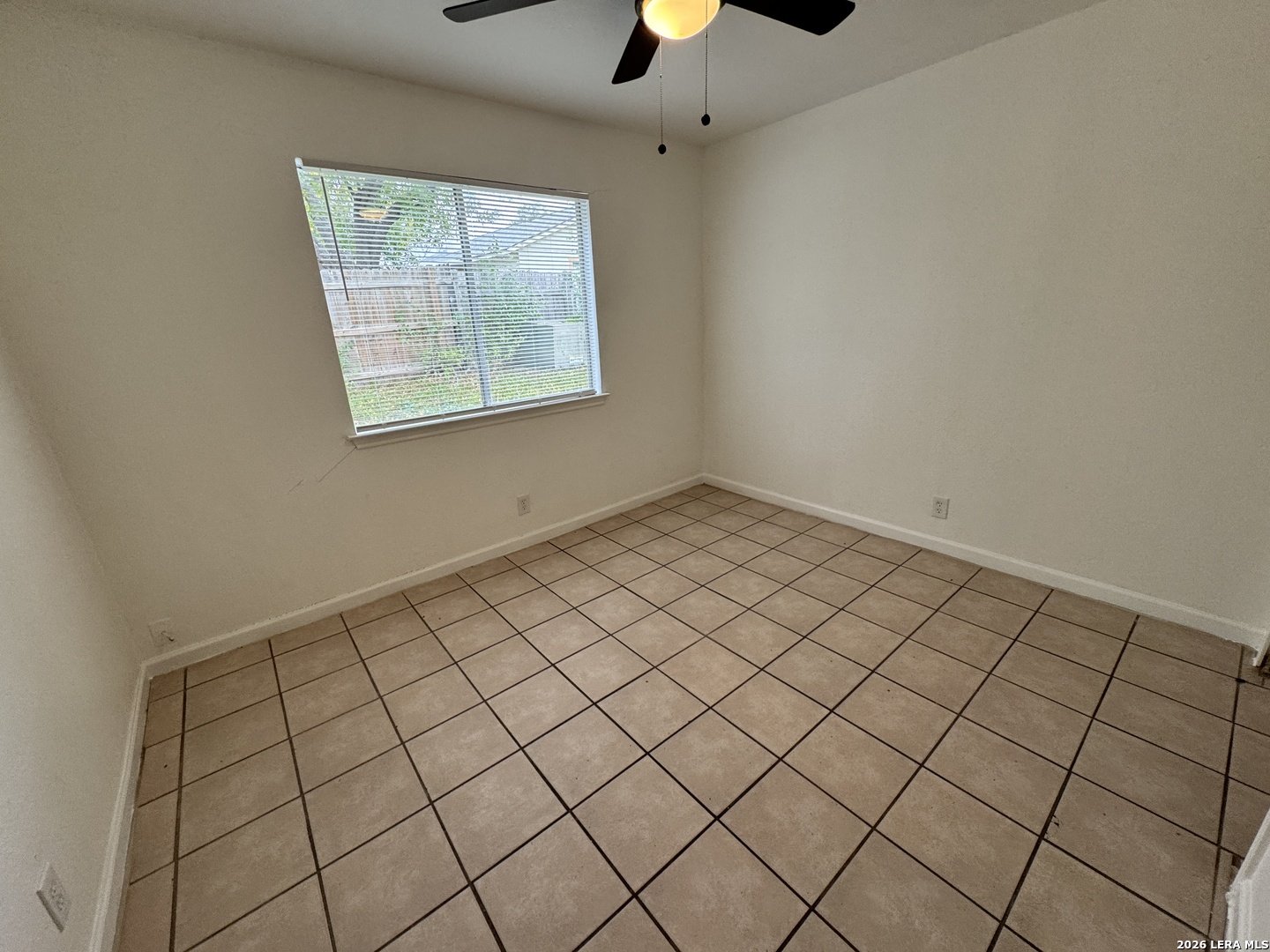 12219 Ridge Crown Street San Antonio, TX 78247 - Photo 14 of 17 an empty room with windows