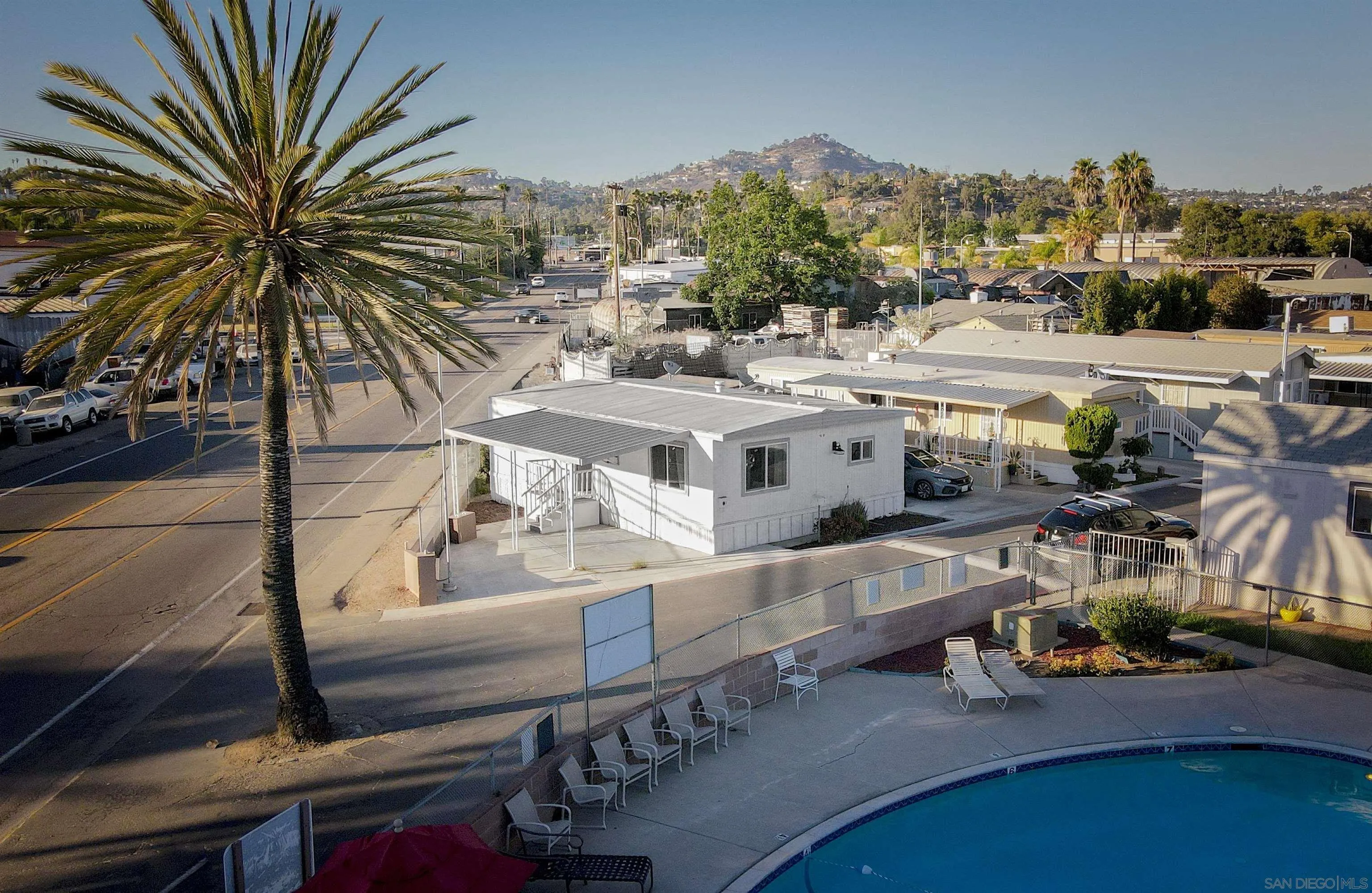 3221 Bancroft Drive, Unit SPC 1 Spring Valley, CA 91977 - Photo 20 of 22 a view of a house with backyard and sitting area