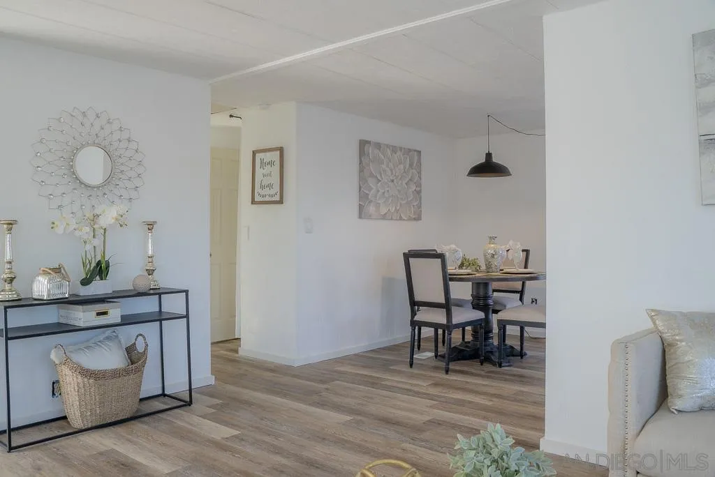 3221 Bancroft Drive, Unit SPC 1 Spring Valley, CA 91977 - Photo 6 of 22 a view of dining room with furniture and wooden floor