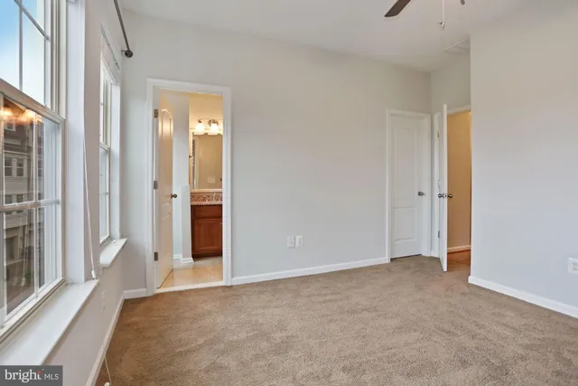 an empty room with windows