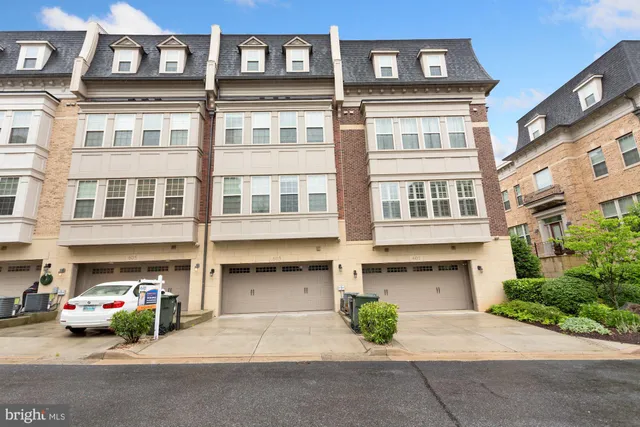 a view of a car parked in front of a building