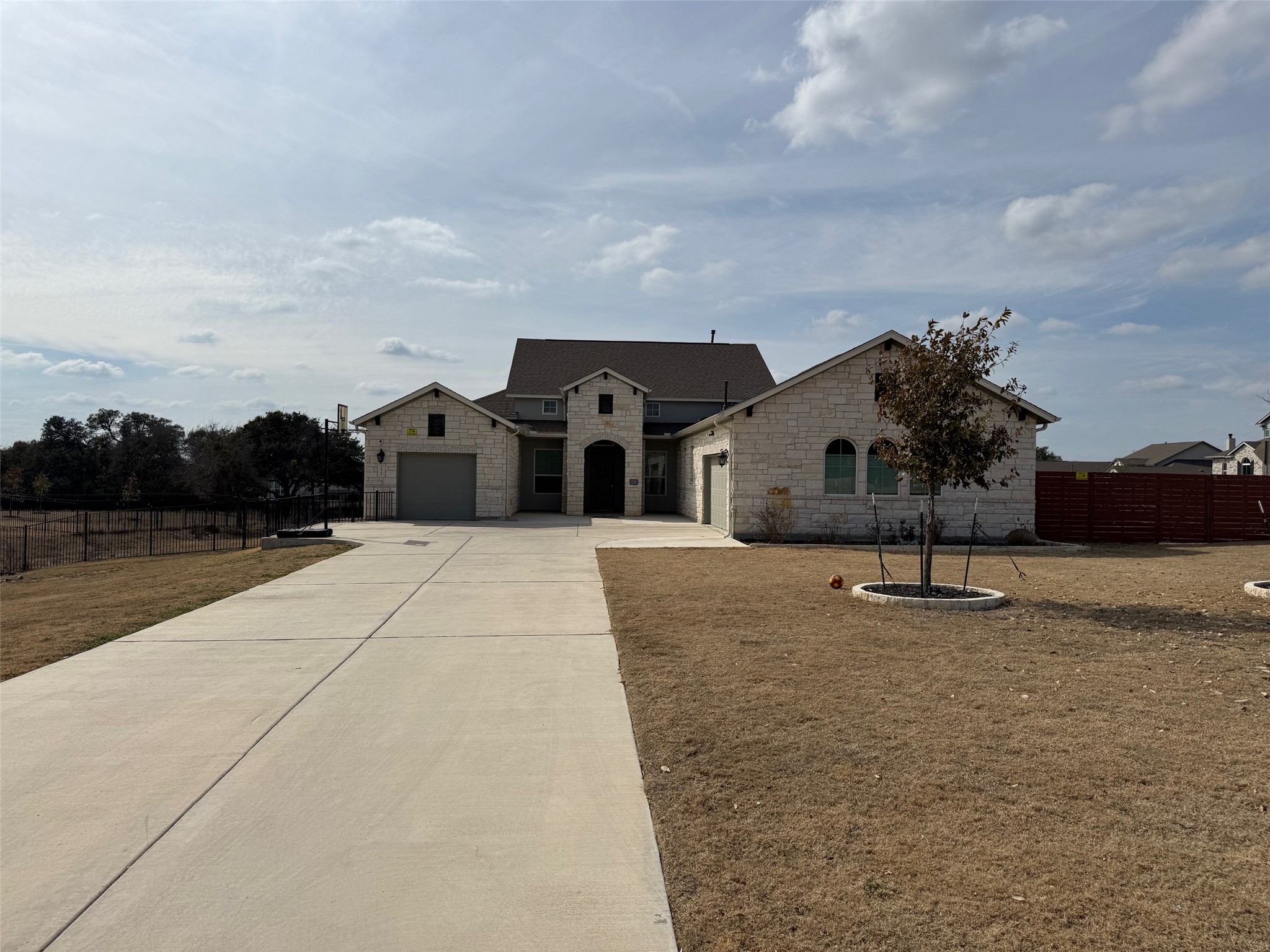 3625 Garrano Bend Leander, TX 78641 - Photo 2 of 31 a picture of houses with outdoor space