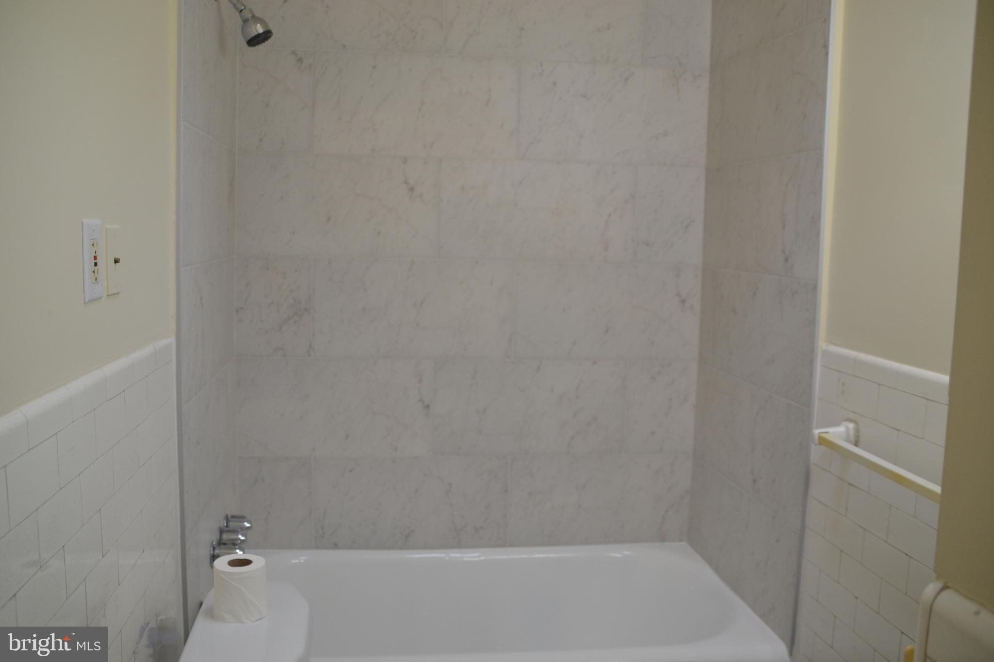 243 Coverly Road Lansdowne, PA 19050 - Photo 22 of 31 a bathroom with a bathtub