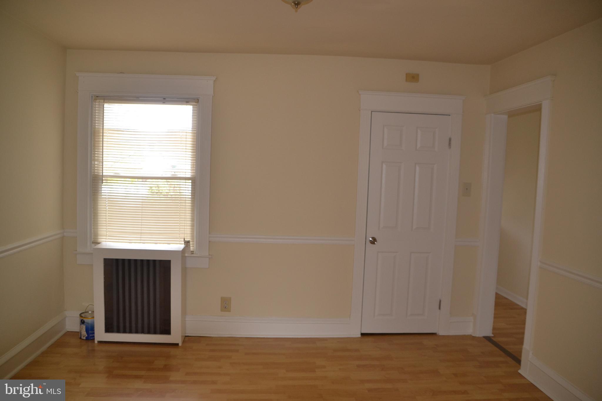 243 Coverly Road Lansdowne, PA 19050 - Photo 7 of 31 a view of an empty room with wooden floor and a window