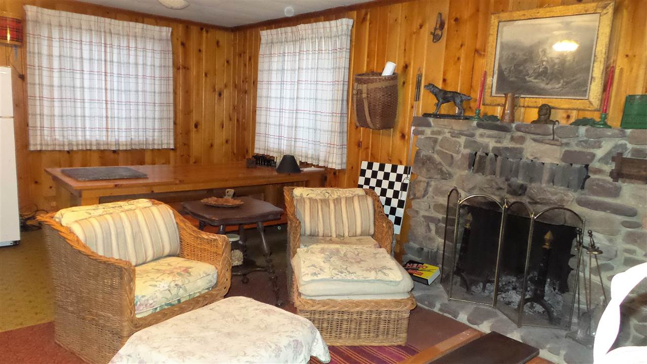 9396 Briery Branch Road Dayton, VA 22821 - Photo 3 of 15 a living room with furniture and a fireplace