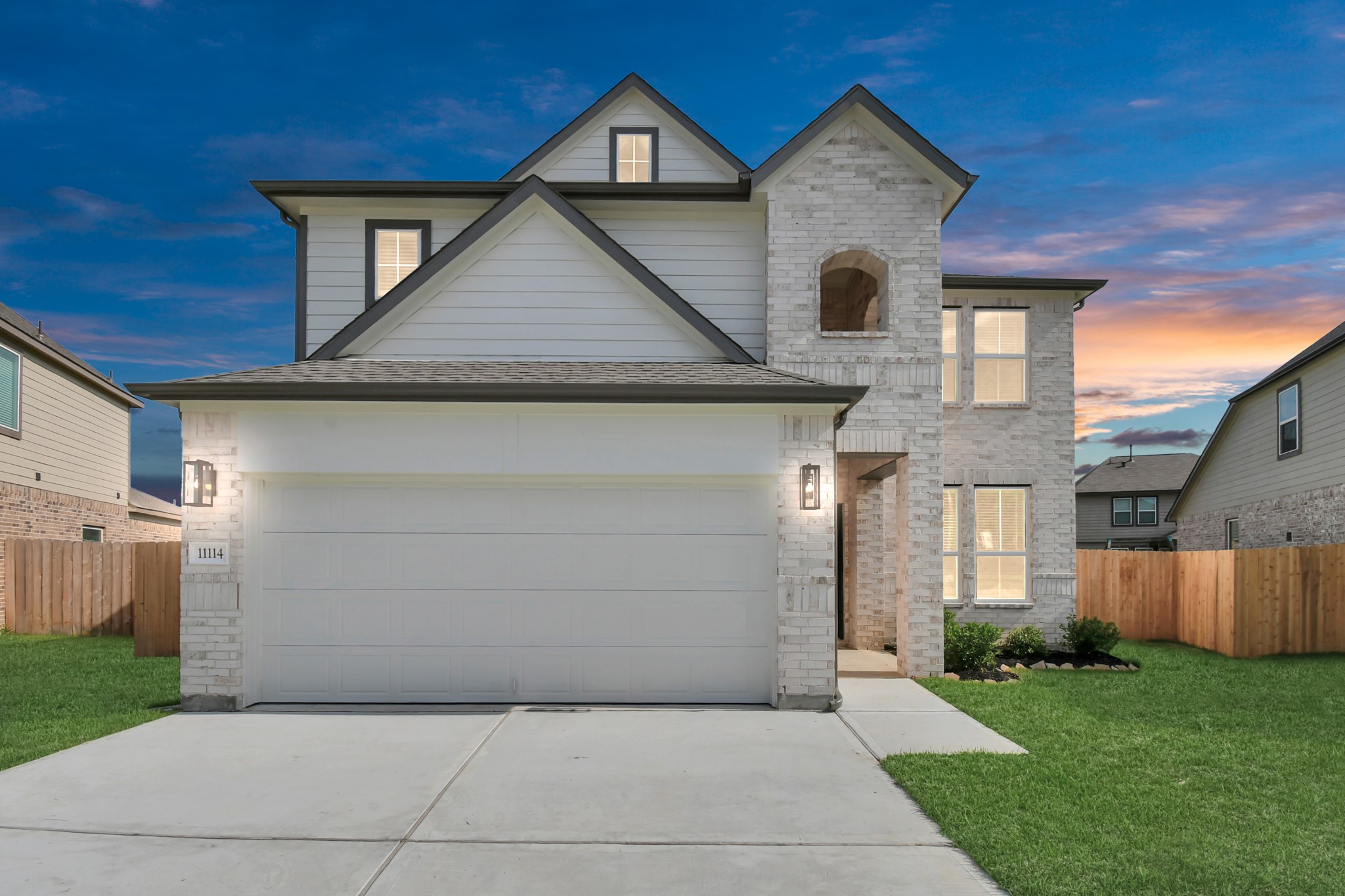 11114 Crocus Drive Houston, TX 77044 - Photo 1 of 28 a front view of a house with a yard and garage