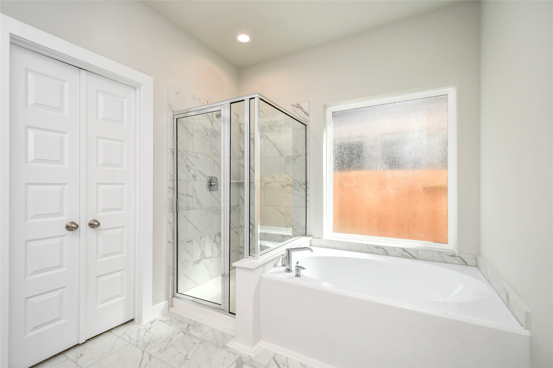 11114 Crocus Drive Houston, TX 77044 - Photo 21 of 28 a bathroom with a bathtub and a shower