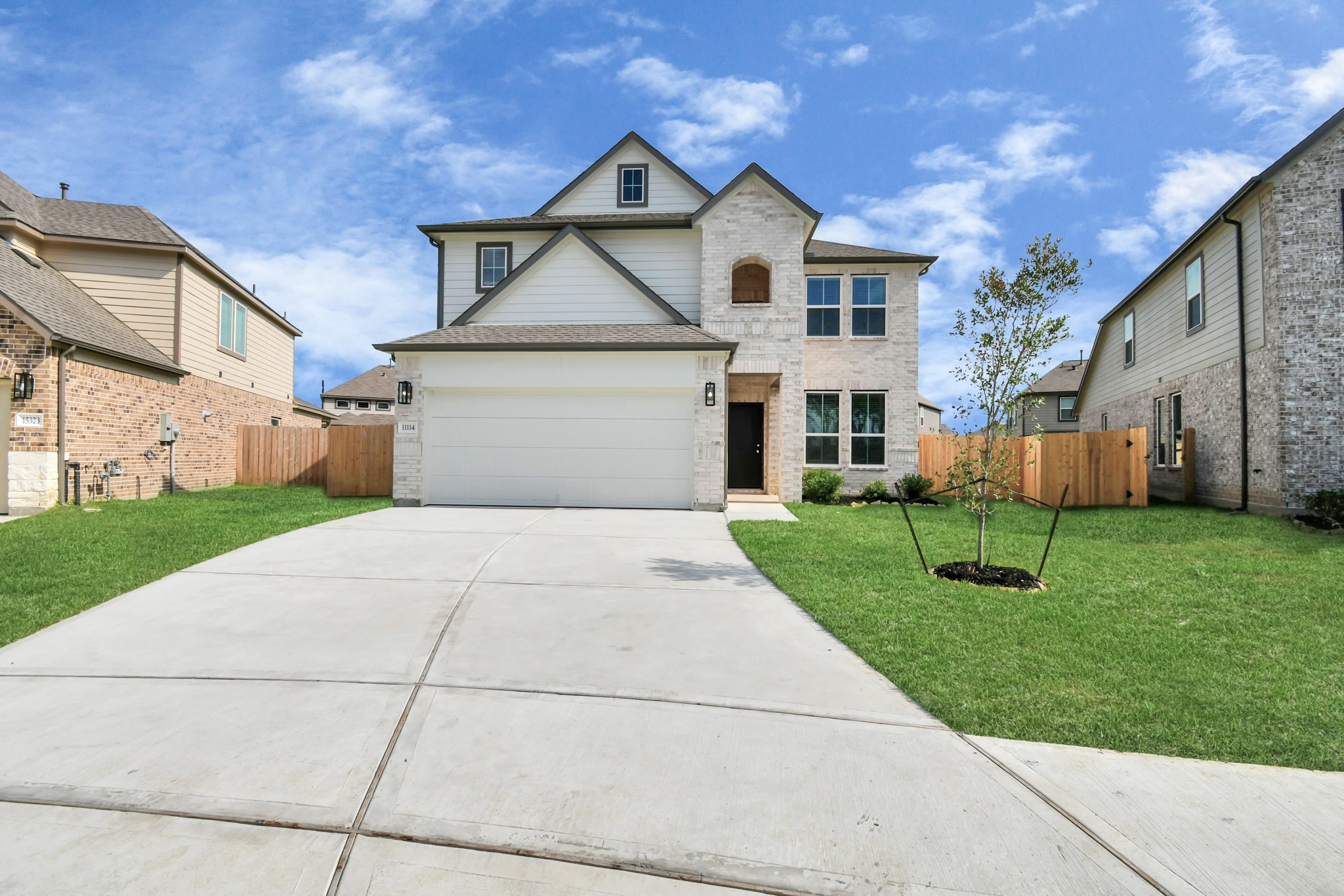 11114 Crocus Drive Houston, TX 77044 - Photo 2 of 28 a front view of a house with a yard