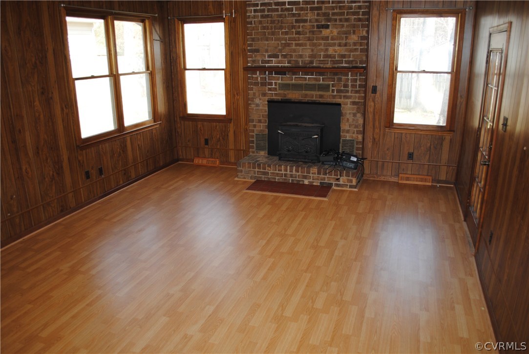 3911 Grovewood Road Hopewell, VA 23860 - Photo 2 of 15 Large Den with fireplace and wood stove insert.