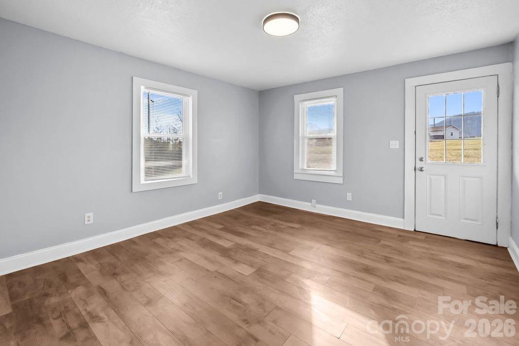 4582 Burkemont Road Morganton, NC 28655 - Photo 6 of 11 an empty room with windows