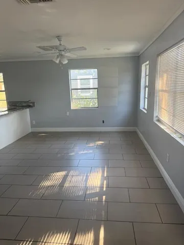 en empty room with windows