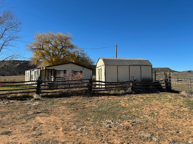 1690 Lower Boulder Road Boulder, UT 84716 - Photo 2 of 13 View of side of property with shed
