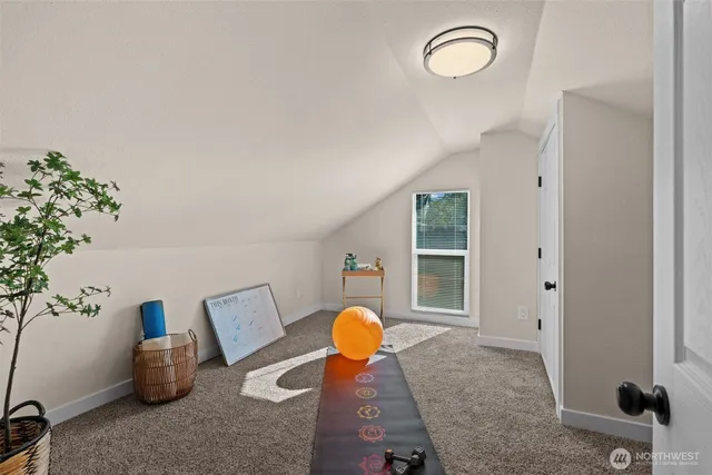 a view of living room with furniture and flower pot