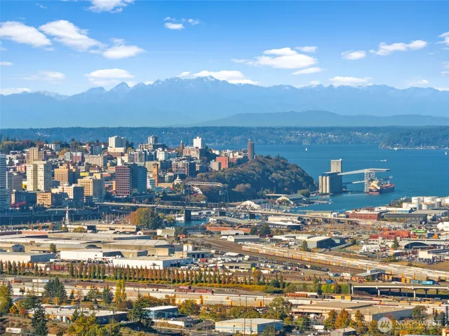 an aerial view of residential building and parking space