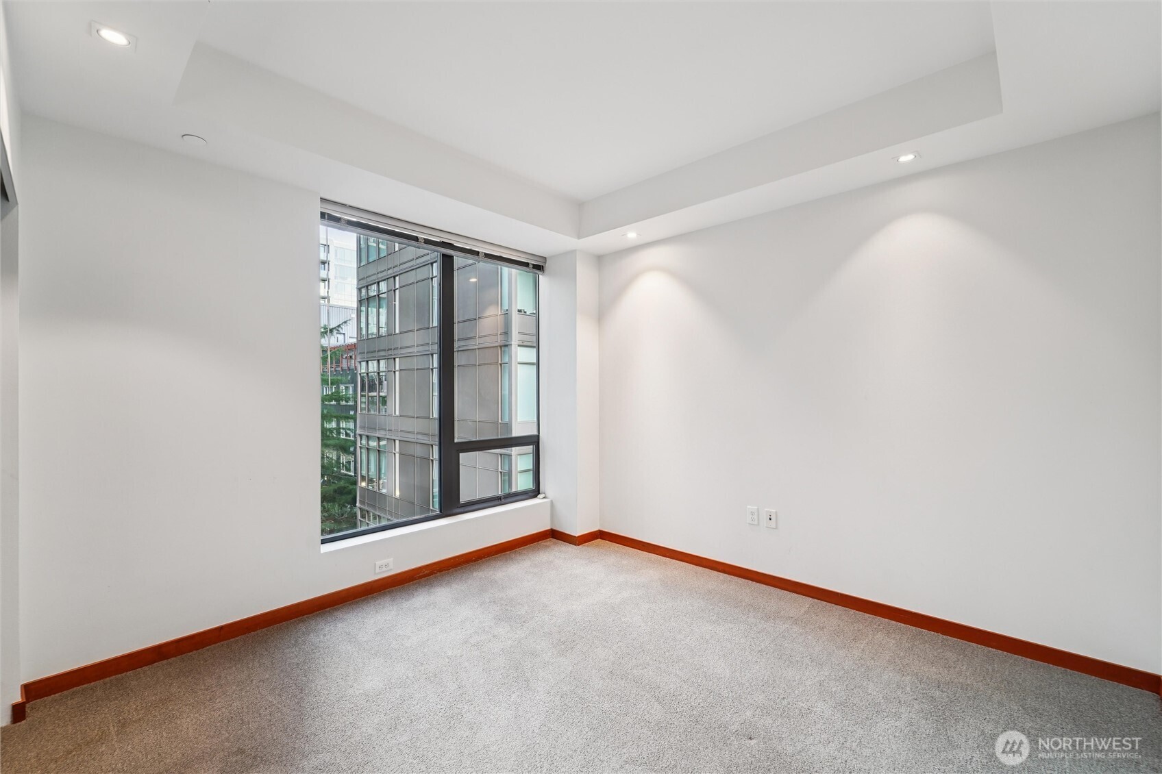 2716 Elliott Avenue, Unit 802 Seattle, WA 98121 - Photo 26 of 34 an empty room with windows