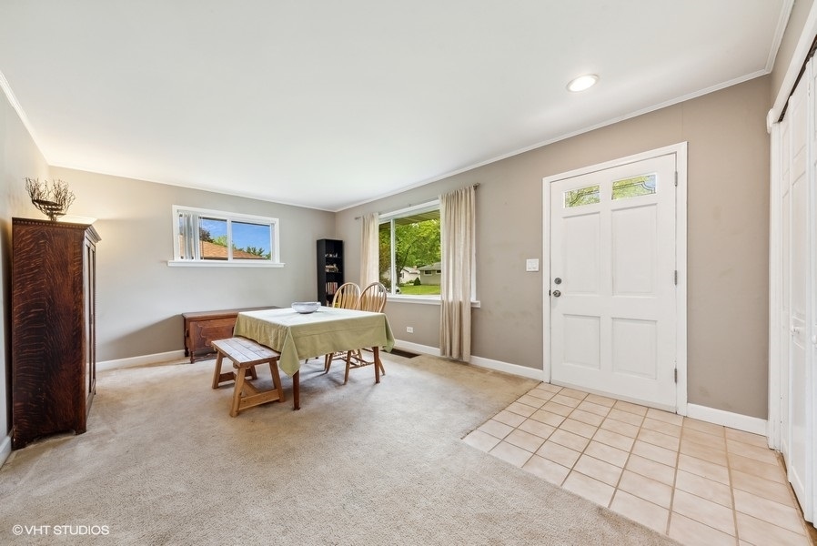 14 Aldine Road Lake Zurich, IL 60047 - Photo 3 of 15 a spacious bedroom with a bed and a window