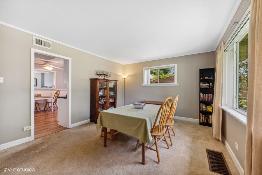 14 Aldine Road Lake Zurich, IL 60047 - Photo 4 of 15 a view of a livingroom with furniture and window